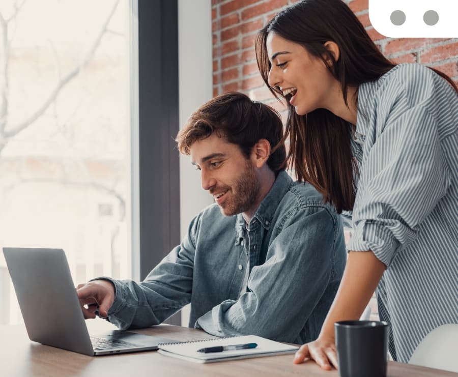 Two sellers reviewing their store performance together