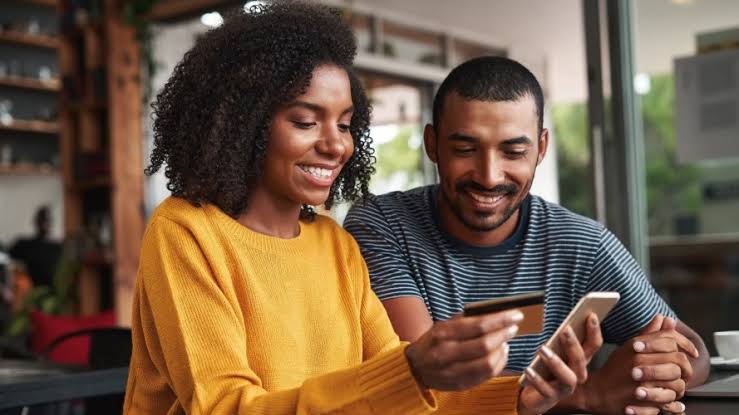 Customers paying by card on their phone